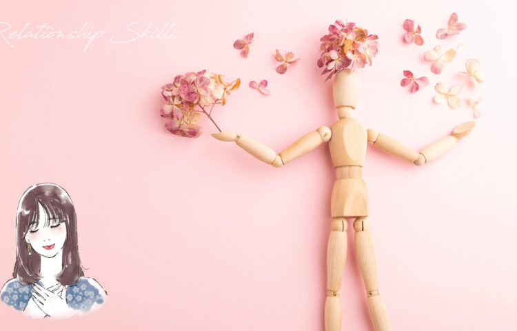 ピンク背景に木製の人形が花を持つ構図と、穏やかに微笑む女性イラスト。期待を手放して、自分自身を満たす感覚を象徴。
